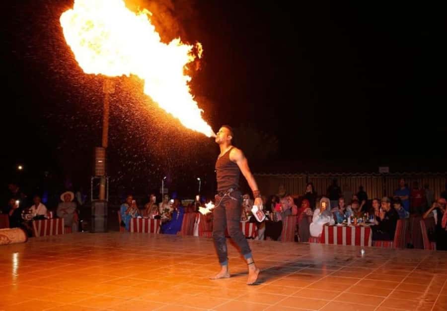 Dubai: Desert Safari Camel Riding, Sandboarding & BBQ Dinner - A short camel ride at sunset