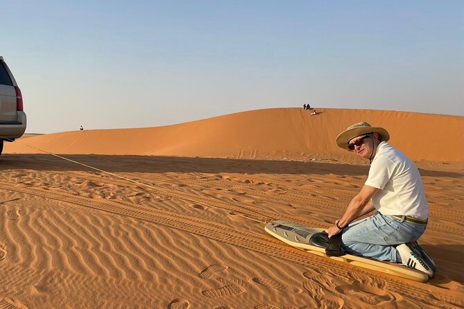 Red Sand Dunes Tour with Camel Ride ,Quad Biking, Heritage House - Sandboarding, games, and optional desert time