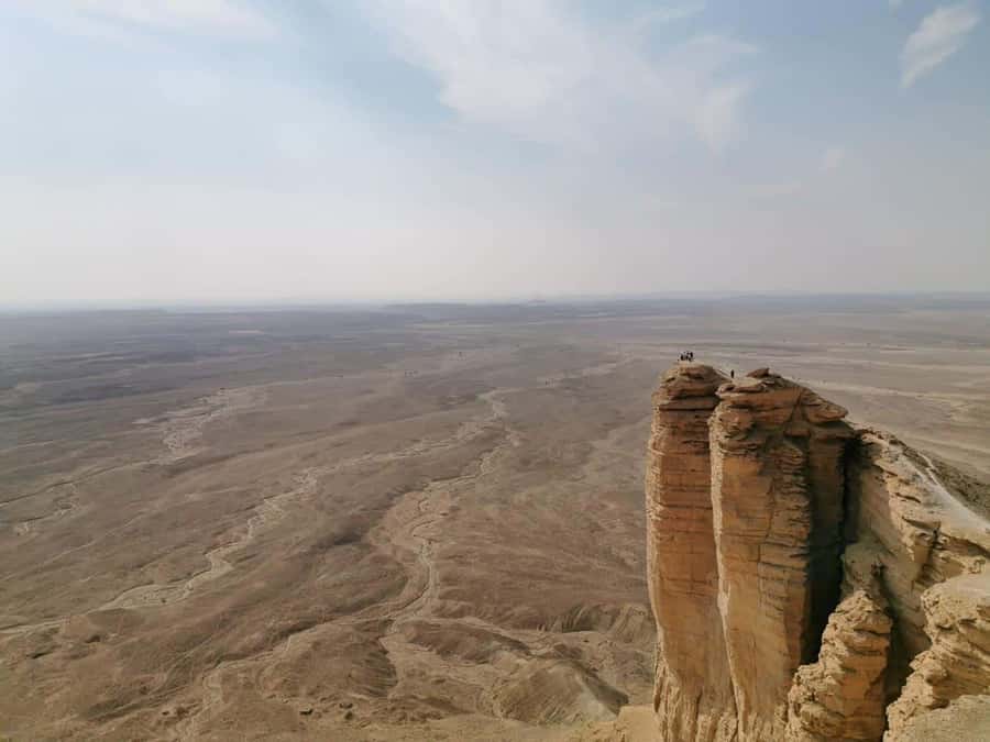 Riyadh Edge of The World and Bat Cave Visit by Bus - Reaching the 1,000-foot escarpment
